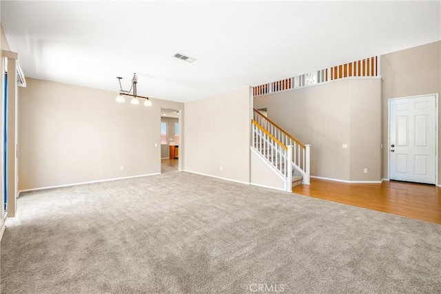 33010 Poppy St, Temecula, CA 92592 - unfurnished living room with carpet flooring, stairway, and baseboards