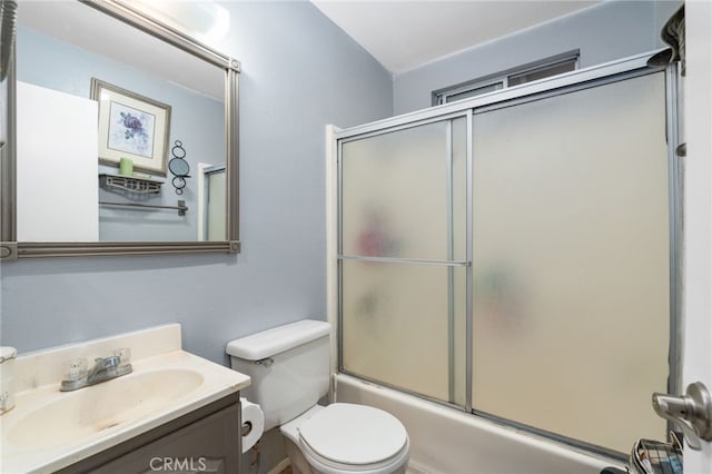 26166 Alpine Ln, Twin Peaks, CA 92391 - bathroom featuring toilet, vanity, and combined bath / shower with glass door