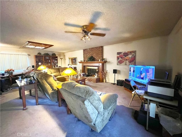 11230 Reliance Dr, Riverside, CA 92505 - living area featuring a ceiling fan, a textured ceiling, carpet floors, and a brick fireplace
