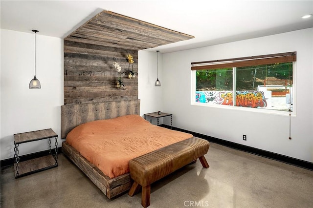 3076 Wauneta St, Newbury Park, CA 91320 - bedroom featuring baseboards, concrete flooring, and wooden walls
