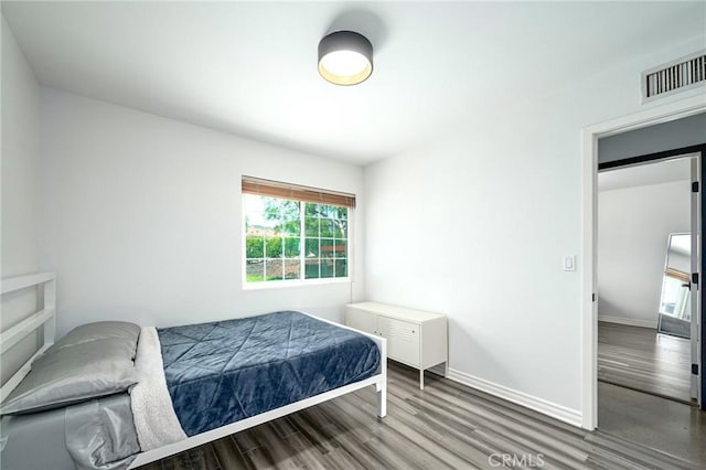 3076 Wauneta St, Newbury Park, CA 91320 - bedroom with wood finished floors and baseboards