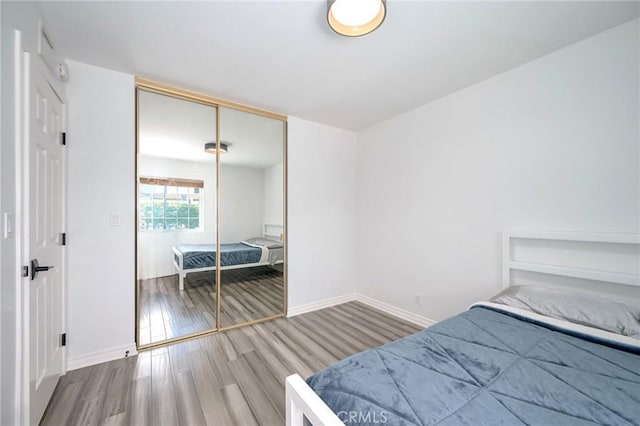 3076 Wauneta St, Newbury Park, CA 91320 - bedroom featuring wood finished floors, baseboards, and a closet