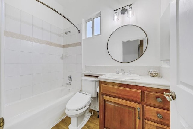 1508 Sequoia Ln, Vista, CA 92081 - bathroom with toilet, vanity, washtub / shower combination, and wood finished floors