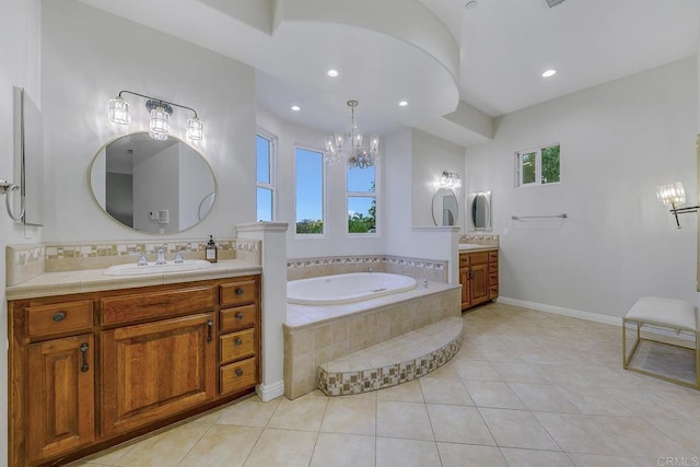 1508 Sequoia Ln, Vista, CA 92081 - full bath featuring a chandelier, two vanities, healthy amount of natural light, a garden tub, and recessed lighting
