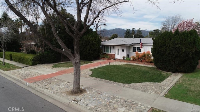 1641 1st St, La Verne, CA 91750 - single story home featuring a mountain view, a front yard, and stucco siding