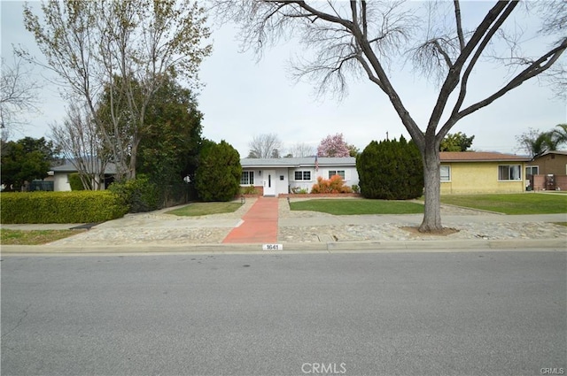 1641 1st St, La Verne, CA 91750 - ranch-style home featuring concrete driveway and a front yard