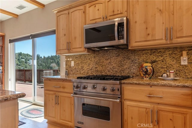 26855 Inyo Ct, Lake Arrowhead, CA 92352 - kitchen featuring appliances with stainless steel finishes, light brown cabinetry, tasteful backsplash, and light stone counters