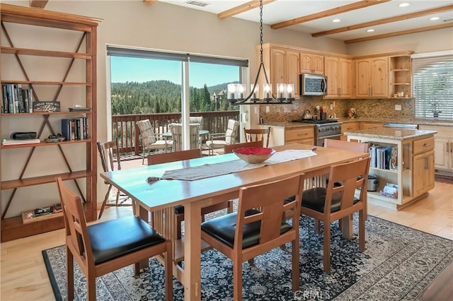 26855 Inyo Ct, Lake Arrowhead, CA 92352 - dining space featuring a chandelier, beam ceiling, light wood-style flooring, and recessed lighting