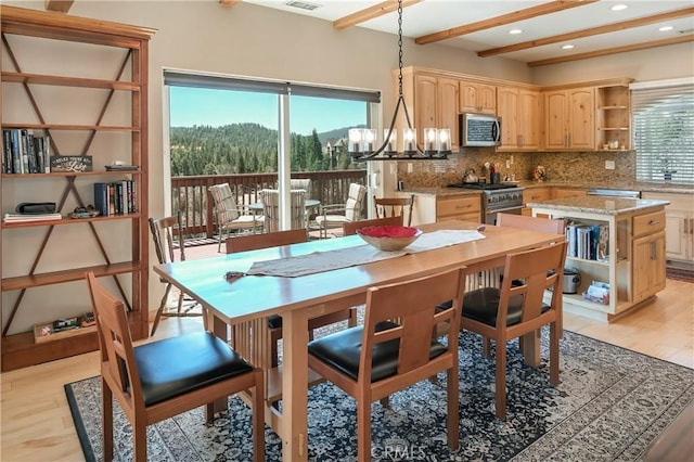 26855 Inyo Ct, Lake Arrowhead, CA 92352 - dining room featuring a chandelier, beamed ceiling, light wood-type flooring, and recessed lighting