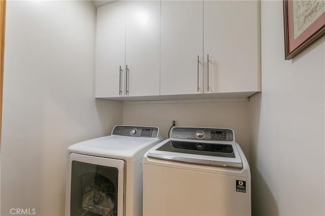 26855 Inyo Ct, Lake Arrowhead, CA 92352 - washroom with washer and dryer and cabinet space