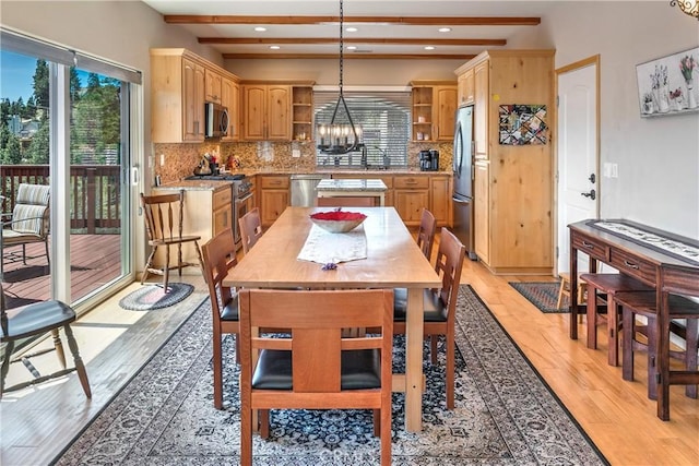 26855 Inyo Ct, Lake Arrowhead, CA 92352 - dining room featuring light wood-type flooring, a chandelier, beamed ceiling, and recessed lighting