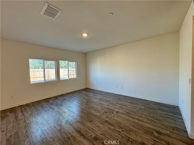 1147 Lentil Way, Chico, CA 95928 - empty room with dark wood-type flooring, baseboards, and recessed lighting