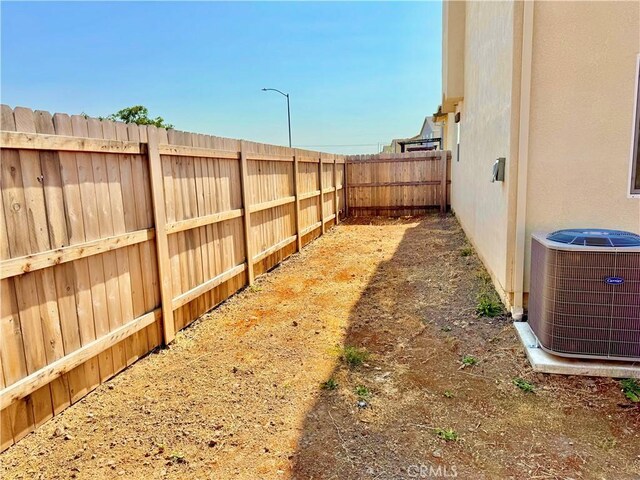 1147 Lentil Way, Chico, CA 95928 - fenced backyard with central air condition unit