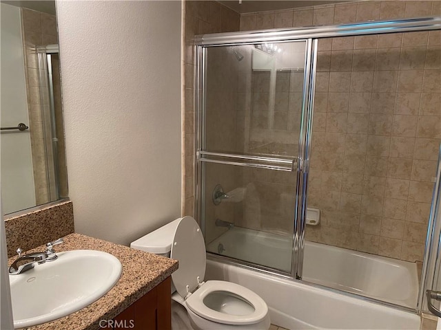 107 N Swall Dr Unit 304, Los Angeles, CA 90048 - bathroom with vanity, toilet, enclosed tub / shower combo, and a textured wall