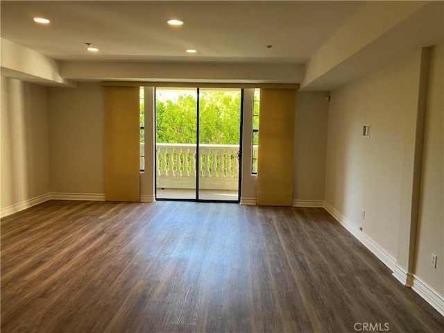 107 N Swall Dr Unit 304, Los Angeles, CA 90048 - empty room with dark wood finished floors, baseboards, and recessed lighting