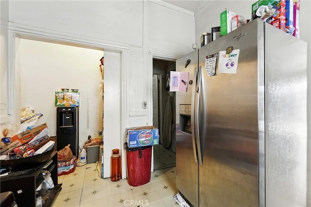 1600 E 33rd St, Los Angeles, CA 90011 - kitchen featuring stainless steel refrigerator with ice dispenser, crown molding, and light floors