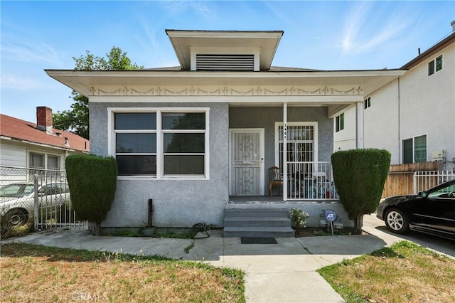 1600 E 33rd St, Los Angeles, CA 90011 - property entrance with stucco siding and a porch