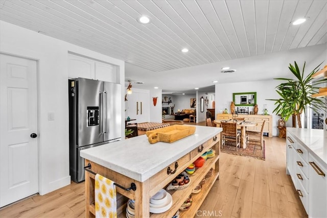 9124 Joshua Ln, Yucca Valley, CA 92284 - kitchen featuring high end refrigerator, recessed lighting, light wood finished floors, white cabinetry, and wooden ceiling