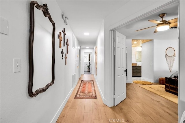 9124 Joshua Ln, Yucca Valley, CA 92284 - corridor featuring light wood finished floors, baseboards, and recessed lighting