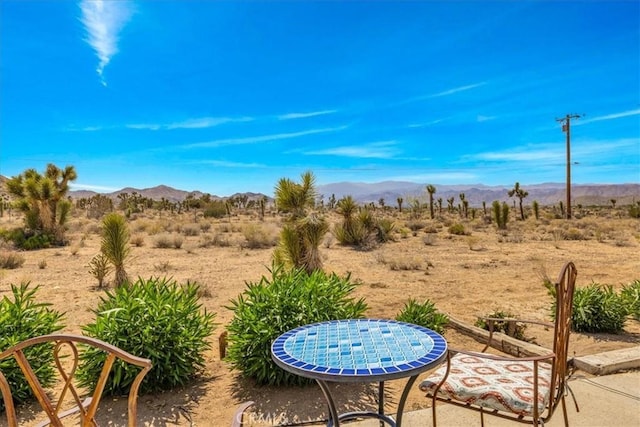 9124 Joshua Ln, Yucca Valley, CA 92284 - view of patio featuring a mountain view