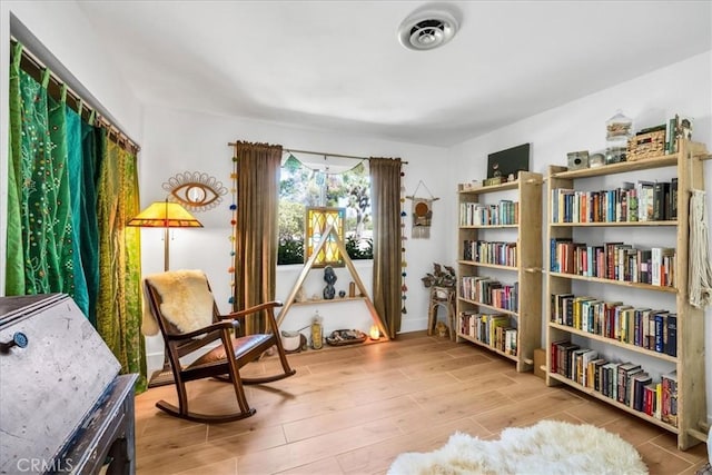 9124 Joshua Ln, Yucca Valley, CA 92284 - living area featuring wood finished floors and baseboards