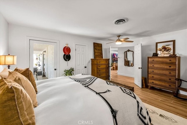 9124 Joshua Ln, Yucca Valley, CA 92284 - bedroom featuring light wood finished floors, baseboards, and ceiling fan