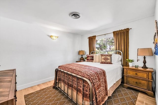 9124 Joshua Ln, Yucca Valley, CA 92284 - bedroom with wood finished floors and baseboards