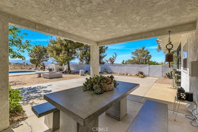 9124 Joshua Ln, Yucca Valley, CA 92284 - fenced backyard featuring a patio and a gate