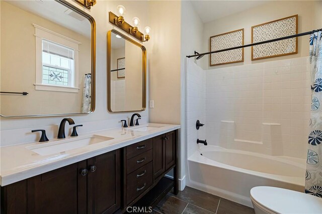 13654 Andover Dr, Magalia, CA 95954 - bathroom featuring shower / bath combo with shower curtain, toilet, and double vanity