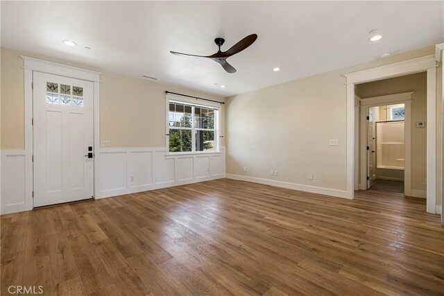 13654 Andover Dr, Magalia, CA 95954 - foyer entrance featuring ceiling fan, wood finished floors, a wainscoted wall, and recessed lighting