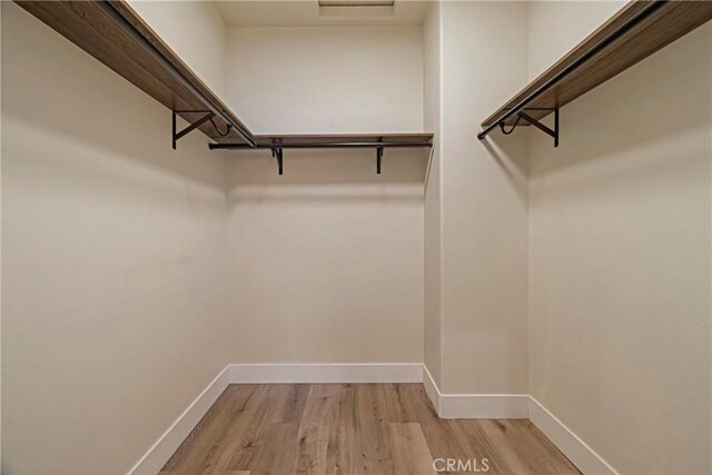 13654 Andover Dr, Magalia, CA 95954 - walk in closet featuring light wood finished floors