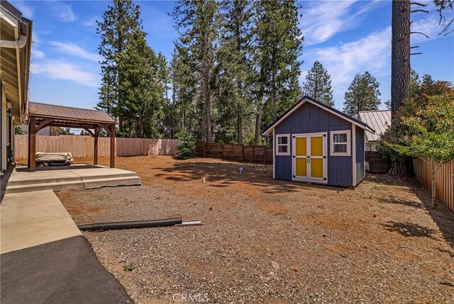 13654 Andover Dr, Magalia, CA 95954 - fenced backyard featuring a gazebo and a patio area