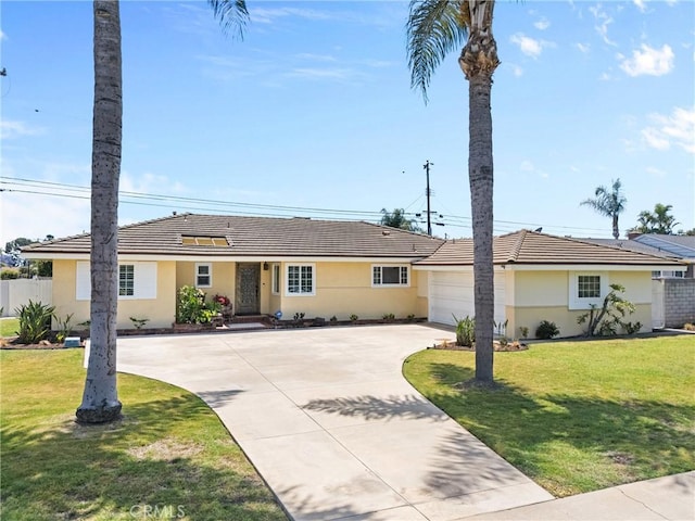 17652 Fiesta Way, Tustin, CA 92780 - single story home with driveway, a garage, stucco siding, and a tile roof