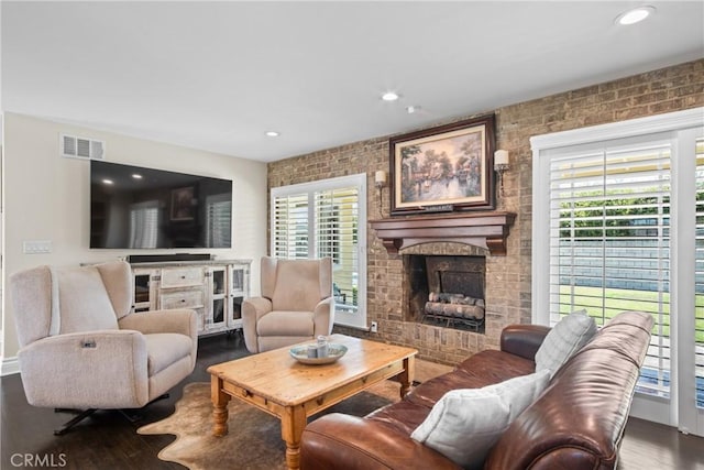 17652 Fiesta Way, Tustin, CA 92780 - living room featuring a brick fireplace, wood finished floors, and recessed lighting