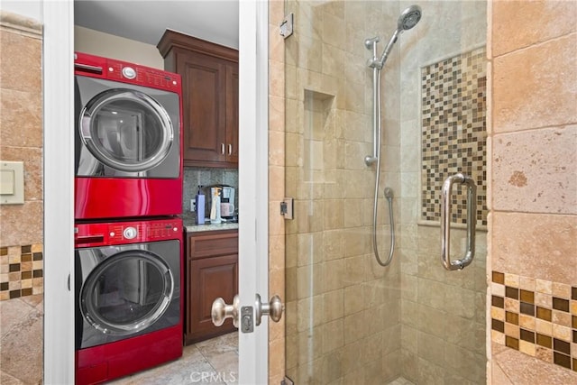 17652 Fiesta Way, Tustin, CA 92780 - bathroom featuring stacked washing machine and dryer and a stall shower