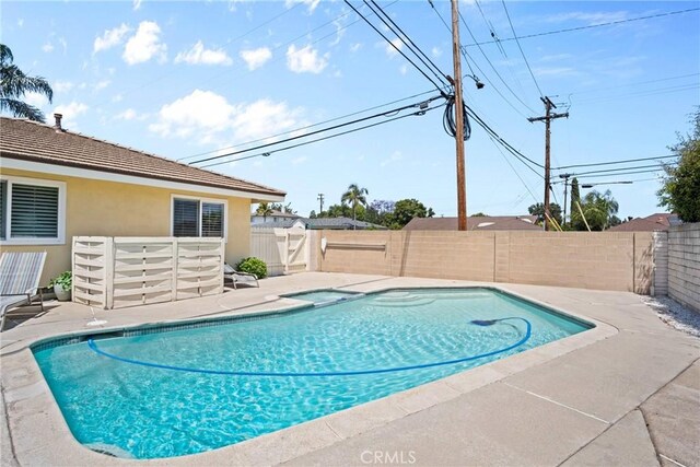 17652 Fiesta Way, Tustin, CA 92780 - view of pool with a fenced backyard, a patio area, and a pool with connected hot tub