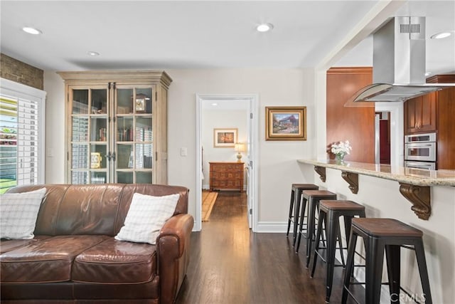 17652 Fiesta Way, Tustin, CA 92780 - living room with dark wood-style floors and recessed lighting