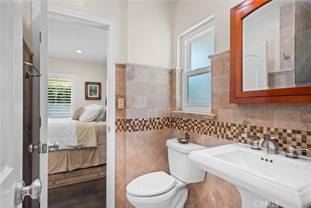 17652 Fiesta Way, Tustin, CA 92780 - ensuite bathroom with tile walls and a sink