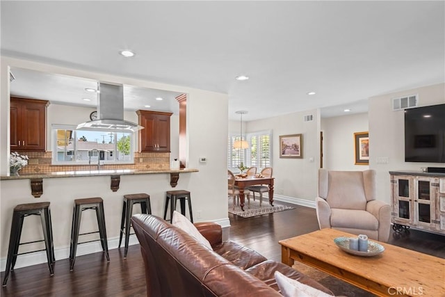 17652 Fiesta Way, Tustin, CA 92780 - living room with dark wood-style flooring and recessed lighting