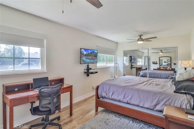 2230 Cordero Ave, Simi Valley, CA 93065 - bedroom with a desk, light wood-type flooring, baseboards, ceiling fan, and a closet