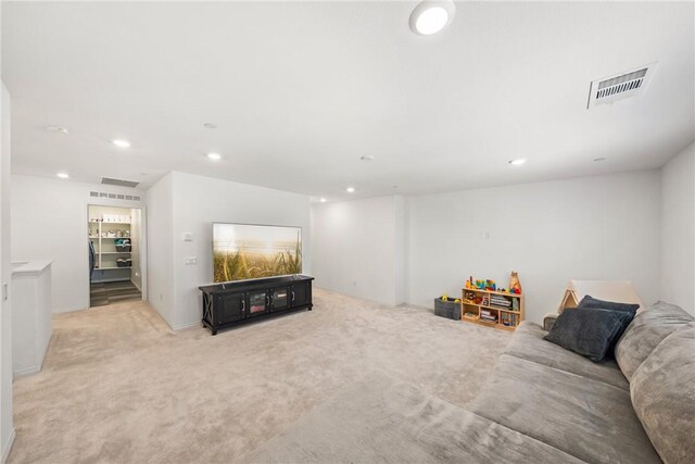 33168 Toledo Bend Ct, Winchester, CA 92596 - living room with recessed lighting and light colored carpet