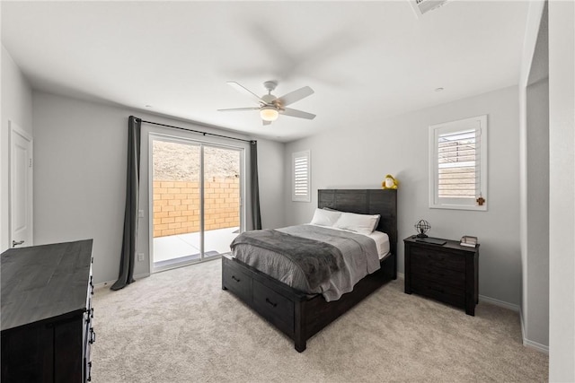 33168 Toledo Bend Ct, Winchester, CA 92596 - bedroom with access to exterior, light colored carpet, and a ceiling fan