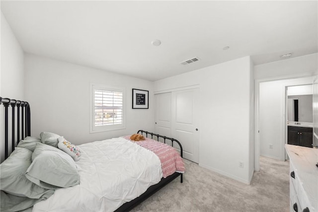 33168 Toledo Bend Ct, Winchester, CA 92596 - bedroom featuring a closet and light colored carpet