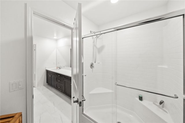 33168 Toledo Bend Ct, Winchester, CA 92596 - bathroom with marble finish floors, an enclosed shower, vanity, and recessed lighting