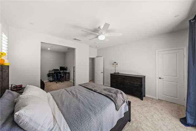 33168 Toledo Bend Ct, Winchester, CA 92596 - bedroom with light colored carpet, ceiling fan, and a desk