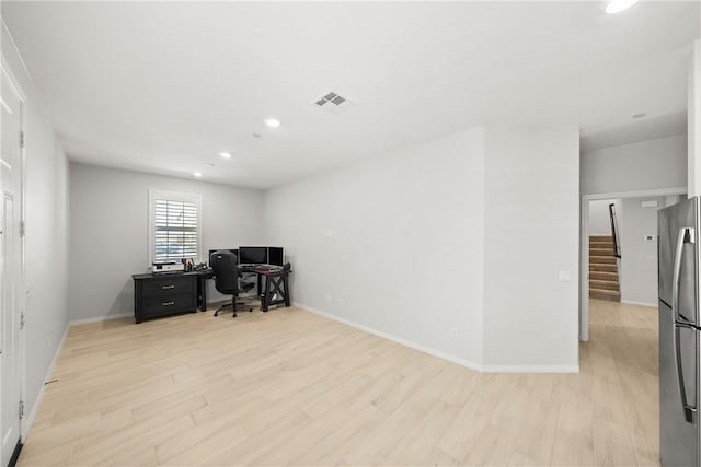33168 Toledo Bend Ct, Winchester, CA 92596 - home office with light wood-type flooring and recessed lighting