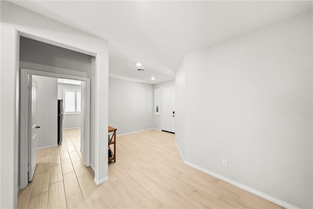 33168 Toledo Bend Ct, Winchester, CA 92596 - spare room with recessed lighting and light wood-style floors