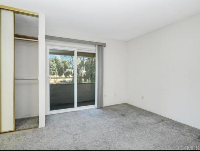 5366 Lake Murray Blvd, La Mesa, CA 91942 - unfurnished bedroom with carpet, access to outside, and two closets