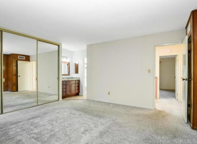 5366 Lake Murray Blvd, La Mesa, CA 91942 - unfurnished bedroom with light colored carpet, a closet, and connected bathroom