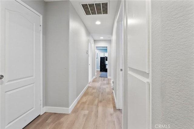 39 Windward Way, Buena Park, CA 90621 - hallway with light wood-style floors and recessed lighting